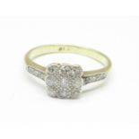 A yellow metal, fifteen stone diamond cluster ring, mark worn, 2.4g, J