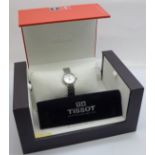 A lady's Tissot wristwatch with diamond bezel, boxed