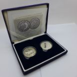 A Royal Mint 2003 Coronation anniversary silver proof crown and a 2002 Golden Jubilee silver proof