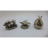 A novelty silver covered/layered pig figure, a similar white metal bird and a Dansk stylised cat