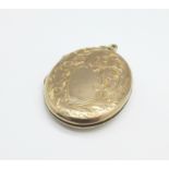 A Victorian locket marked '9ct Gold Sides'