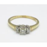 A 9ct gold ring set with nine diamonds, 2g, N