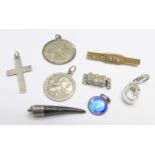 Two silver St. Christopher pendants, etc.