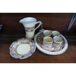 Honiton Pottery; a Western pattern jug and saucer, egg cups and tray