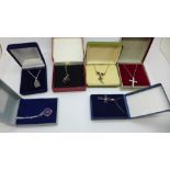 Six silver gem set pendants and chains