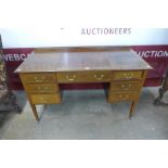 An Edward VII inlaid mahogany desk