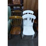 A pair of elm seated kitchen chairs and a pair of painted chairs