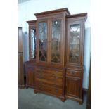 A George III style hardwood breakfront bookcase/display cabinet, 226cms h, 178cms w, 53cms d