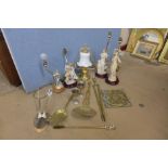 Six assorted lamps including three lady figurines and a brass companion set