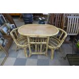 A bamboo table and two chairs