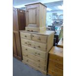A six drawer pine chest and a pine single door bedside cabinet