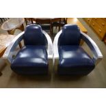 A pair of blue leather Aero chairs