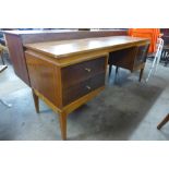 A Uniflex teak desk