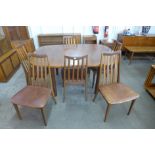 A G-Plan teak extending dining table and six Fresco chairs