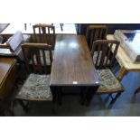 An oak barleytwist gateleg table and four chairs