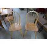 A pair of Ercol Blonde chairs