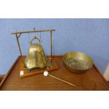 A brass bell with gong and a brass bowl