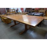 A Danish teak extending dining table