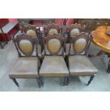 A set of six Victorian mahogany and upholstered chairs