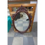 A carved mahogany framed mirror
