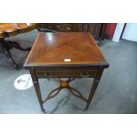 An Edward VII inlaid mahogany envelope card table