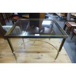 A French brass and glass coffee table