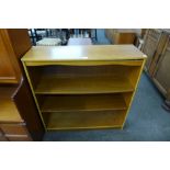 A teak open bookcase