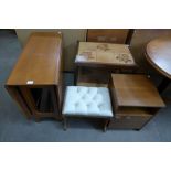 A teak gateleg table, bedside table, tiled top trolley and a stool