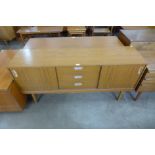 A simulated teak sideboard