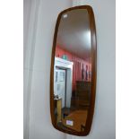 A teak mirror