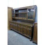 A carved oak dresser