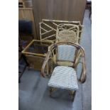 Two wicker chairs, an occasional table and a headboard