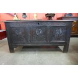 A 17th Century carved oak coffer