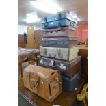 Assorted suitcases and holdall