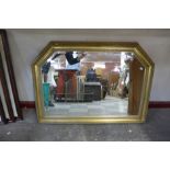 A gilt framed overmantel mirror