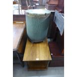 An oak coffee table and a Lloyd Loom linen box