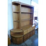 A Nathan teak bookcase and matching corner cabinet