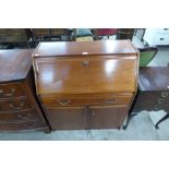 A teak S-Form bureau