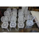 A set of twelve cast alloy garden chairs, one a/f