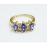 A 9ct gold, tanzanite and diamond ring, 3.6g, O