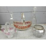 Two glass baskets, a rose bowl and two glass decanters **PLEASE NOTE THIS LOT IS NOT ELIGIBLE FOR