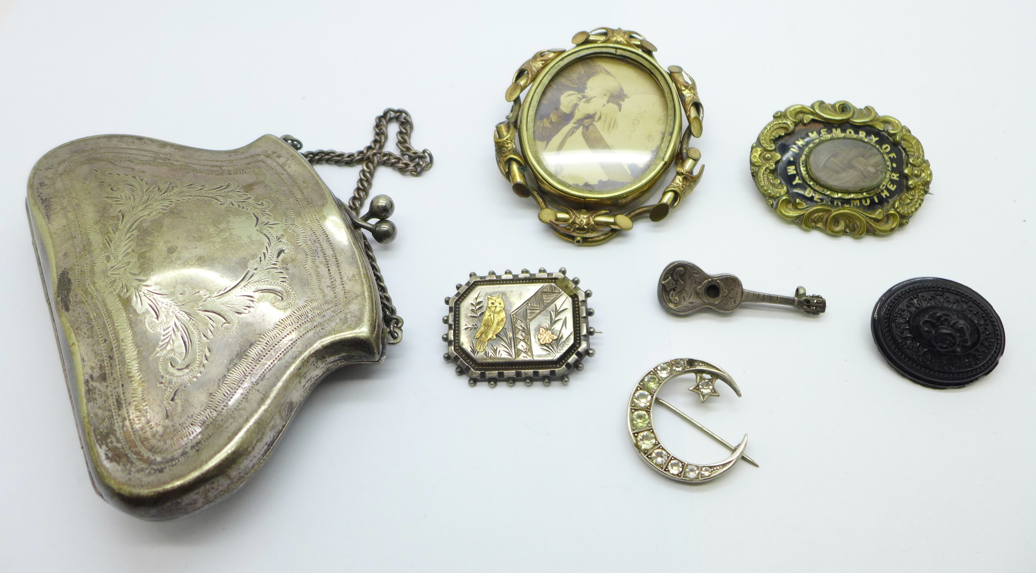 Two hallmarked Victorian silver brooches, crescent moon, lacking hook and stone, and guitar, an