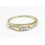 A 9ct gold, eight stone diamond ring, 1.8g, P