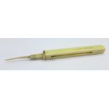A Sampson Mordan & Co. yellow metal and ivory tooth pick