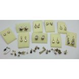 Nineteen pairs of silver earrings