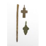 Two bronze Viking crosses and a spear head, found in Russia