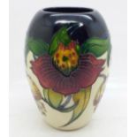 A Moorcroft vase, Anna Lily pattern, shape no. 102/5, by designer Nicola Slaney, 13cm