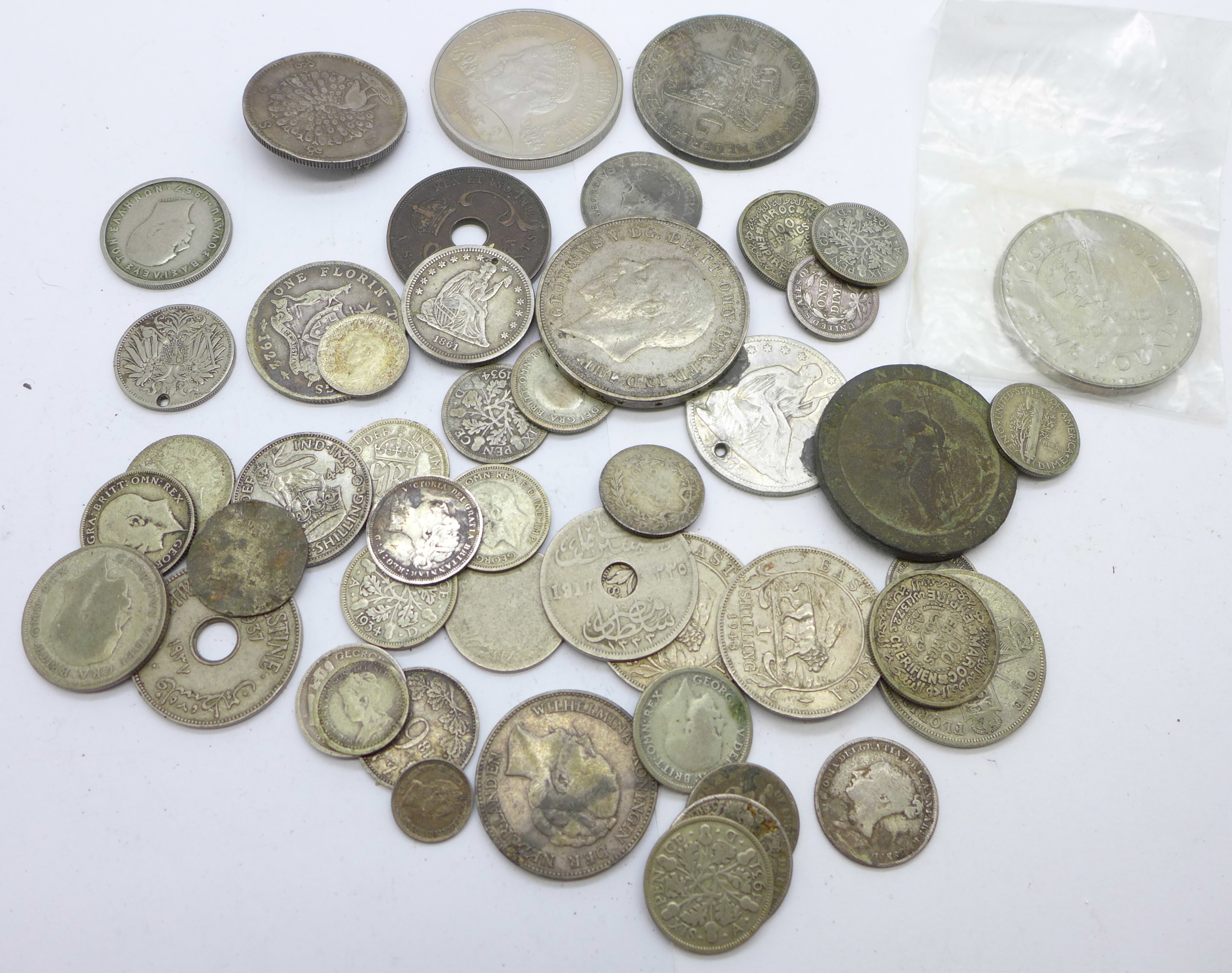 Coins including silver