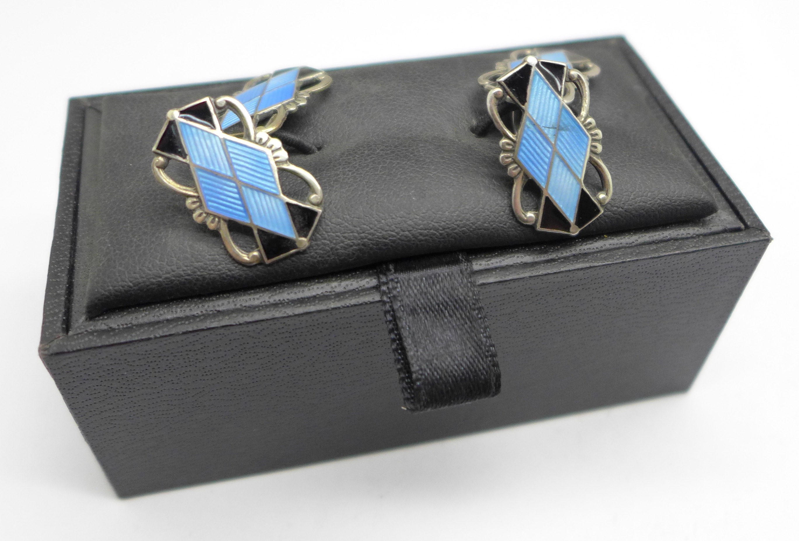 A pair of blue and black enamel over silver cufflinks, marked 925 and Norne, with Norwegian mark