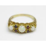 A 9ct gold, opal and garnet ring, 3.3g, S